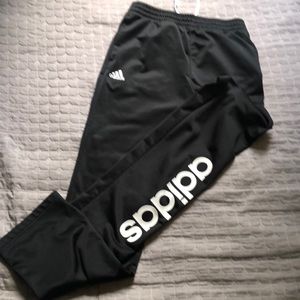 Adidas track pants fits small